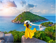 Traveller overlooking a coastal landscape in China